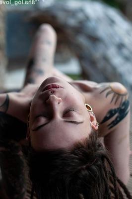 16P Tattooed female Cutz sports dreadlocks while showing her tiny tits