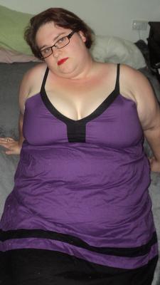 15P Amateur fatty LaLa Delilah shows her sexy cleavage before stripping down