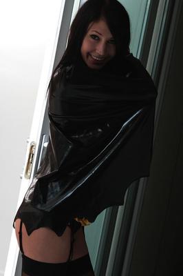 15P Cute teen Catie Minx strips off Batgirl lingerie in black stockings