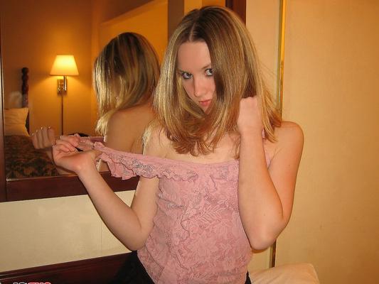 12P Petite teen Shelby strips naked in front of her hotel mirror and begins to