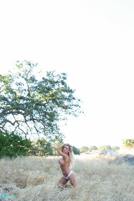 21P Stunning blonde Capri Cavanni strips naked in nature & flaunts her killer body