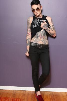 20P Inked pornstar Nikki Hearts drops her black outfit and reveals her titties