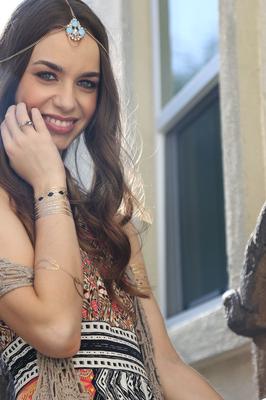 17P Gorgeous teen Tali Dova strips down to her panties and brown boots outdoors