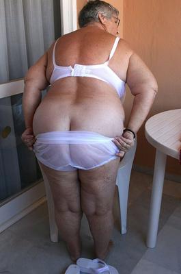 20P Obese grandmother GrandmaLibby parts her labia lips after disrobing on balcony