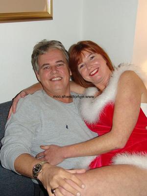 21P Mature amateurs doff their Xmas clothes and get fucked in wild group sex