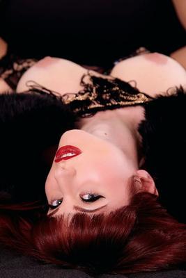 21P Romanian redhead Andrea Rosu drinks wine while posing in her dominant outfit
