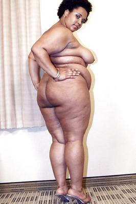 16P Mature ebony fatty Kitten posing for solo shoot in lingerie and heels