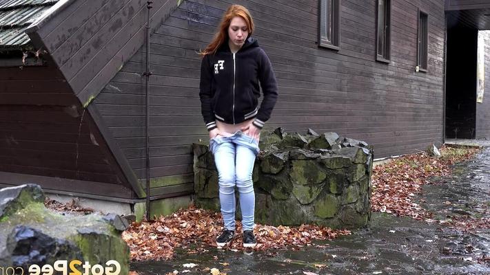15P Cute redhead Sandra on a country walk pausing to squat for a hot outdoor pee