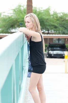 16P Petite blonde girl flashes her tits and bald twat as she walks down a sidewalk
