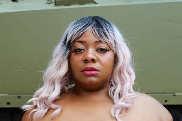 12P Obese black woman Carmelotto Rush shows her thong clad butt afore a tank