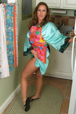 21P Sweet mom with a big ass Charlie shows her boobs in the kitchen