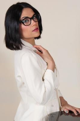 12P Dark-haired beauty Chiara pulls off her stockings in a teasing manner