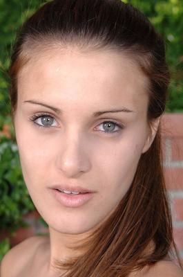 16P Girl next door Andie exposes her hanging labia lips afore a brick wall