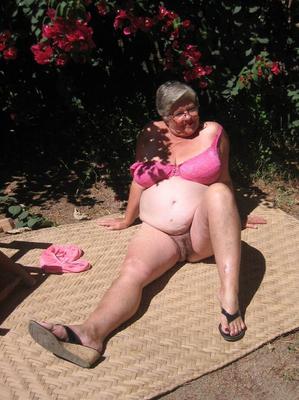 20P Obese granny Girdle Goddess strips to her sandals on garden patio