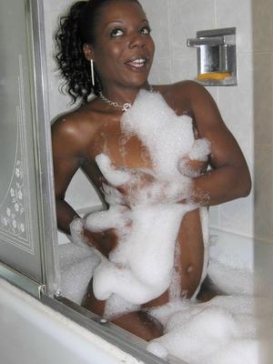 21P Alluring ebony MILF Anastasia	soaps and washes her curvaceous body