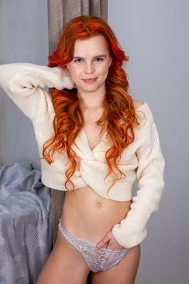16P Skinny redhead Alaya spreads her tight pussy wide open in the buff