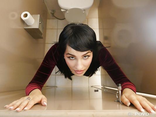 16P Slender dark-haired woman Allora Ashlyn masturbates in ladies room
