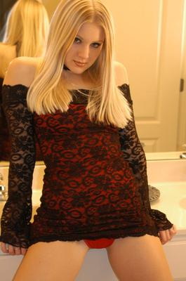 12P Hot teen with blonde hair poses productively while exposing upskirt thong