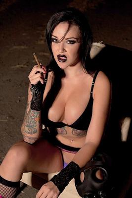 15P Tattooed girl Emily Parker takes off a gas mask and black bra outside at night