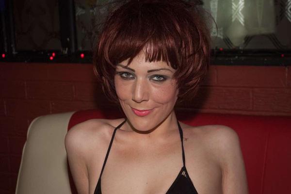 15P Redhead chick Porscher Wells slides black lingerie aside to reveal her snatch
