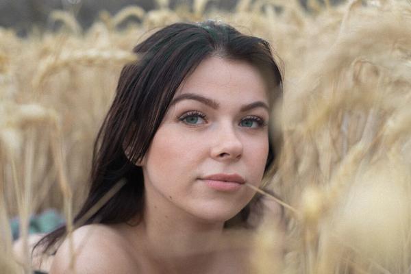 21P Breathtaking amateur babe Lyalya massages her big tits in a wheat field