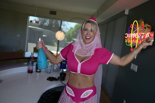 11P Cute blonde housewife releases her hooters from Jeanie outfit
