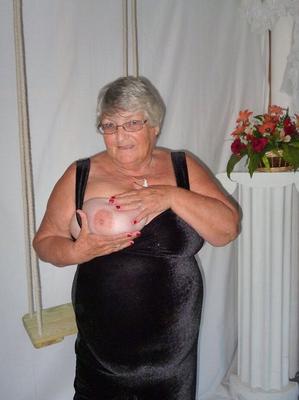 20P Fat nan Grandma Libby takes off a black dress to model naked in stockings