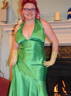 16P Tattooed amateur Mollie Foxxx exposes herself afore a fireplace in a dress