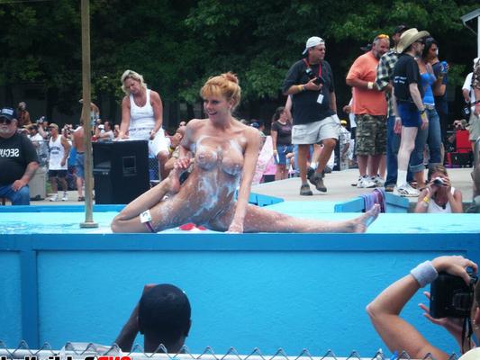 12P Lots of big tit girls stripping on an outdoor stage for all to watch
