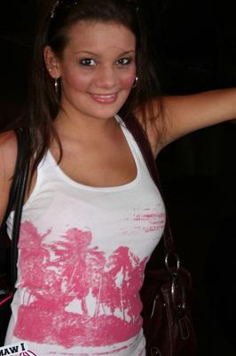 12P Fresh-faced amateur Kate Crush wanders city streets in a tank top and jeans