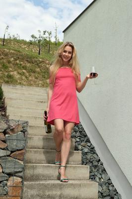 16P Flexible blonde Alecia Fox sticks a banana inside her pussy on a patio