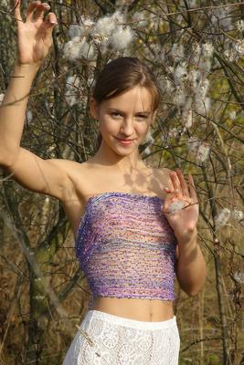 12P Teen solo girl heads into the bushes and trees for nude modeling session