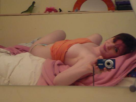 12P A very horny Sadie cups her massive tits with her hands