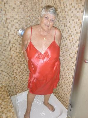 20P Fat old woman Grandma Libby blow dries her hair after showering
