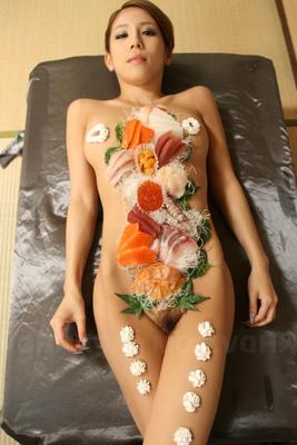 21P Sweet Asian babe Ramu Nagatsuki gets toyed while covered with sushi on a table