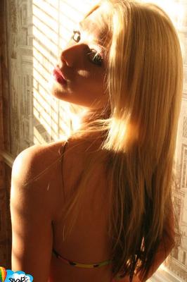 12P Blonde amateur Skye Model releases her teeny tits from a bikini