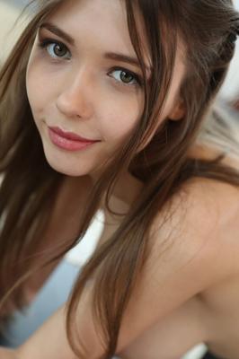 21P Ukrainian teen with big tits Mila Azul strips & poses naked by the window