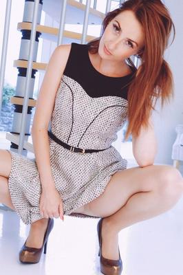 12P Redhead Sophia Smith stands naked with panties around thighs after disrobing