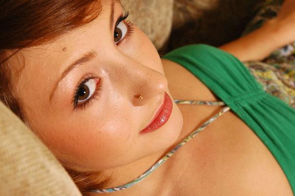 16P Natural redhead Loretta finger spreads her trimmed pussy during her nude debut