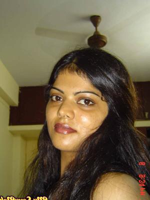 15P Indian woman Neha takes self shots while she holds her face firm