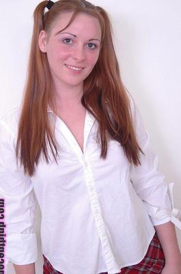 17P Innocent redhead schoolgirl Kylie Haze looks seductively and shows her panties