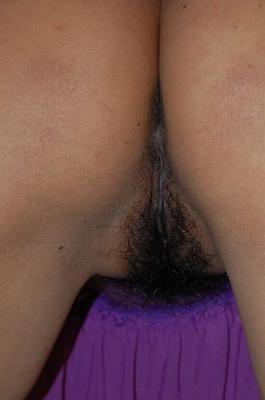 19P Hairy brunette chick Kisa posing in solo scene in white stockings