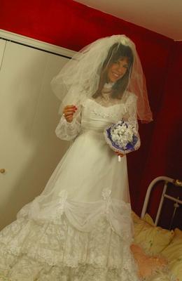 12P Hot bride Miss Abigail in stockings & high heels enjoys lesbian strapon fuck