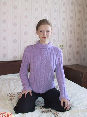 17P Young looking girl wears her hair in braid while stripping to white socks only