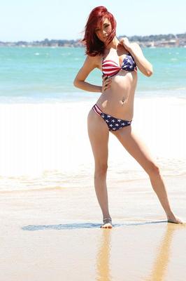 12P Pale redhead Kylie Cole doffs cutoffs to model USA themed bikini at the beach