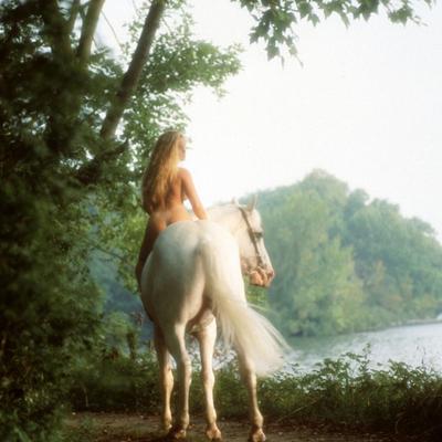12P Saucy blonde Natalie Smith flashing pussy everywhere & riding a horse nude