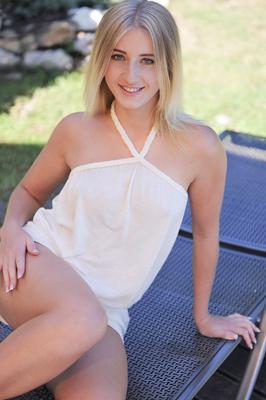 15P Blonde girl Aria Logan blows her old lover before fucking on patio