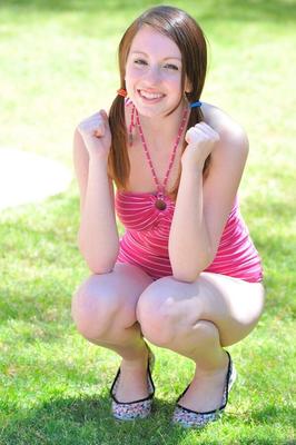 15P Nice teen flashes cute panties on the lawn inserting a garden hose in her twat