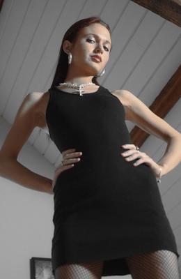 12P Dark haired glam model in a black dress rips off her fishnet pantyhose