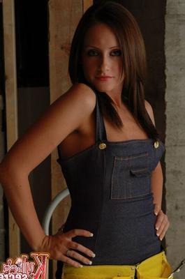 12P Amateur model Kylie uncovers her perky tits on the site of a home renovation